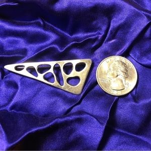 Silver colored pendant brooch with holes like Swiss cheese. Cool & abstract EUC